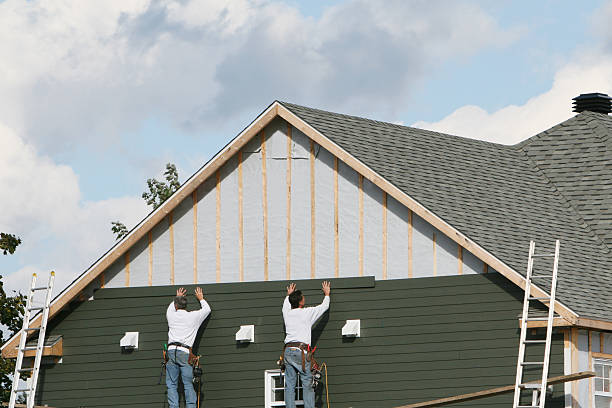 Professional Storm Damage Siding Repair technician working in Hastings, PA